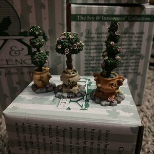 Miniature decorative topiary figurines from the ivy & innocence collection